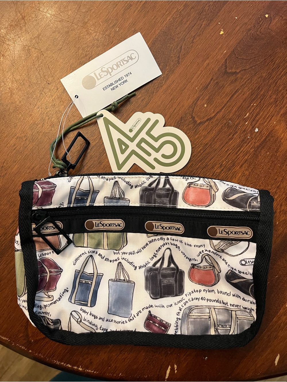 LeSportsac White Cosmetic Pouch with Multicolor Bag Print
